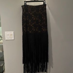 Alexis size small black lace overlay fringed skirt.
